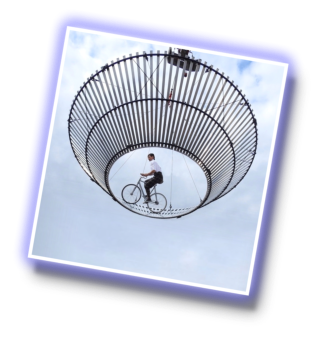  FLORIAN BLMMEL - Cycle Artist - performing THE BICYCLE WALL OF DEATH Open Air, hanging at a mobile crane high above the audience.